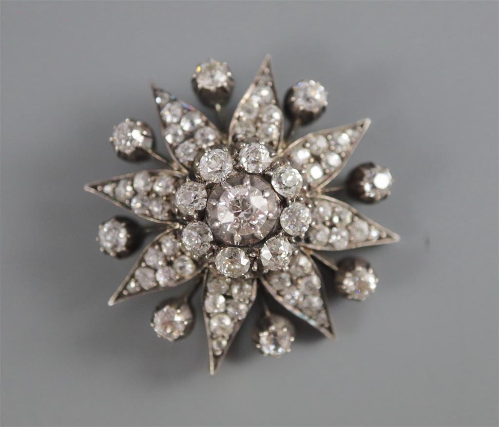 A Victorian gold, silver and diamond starburst pendant,